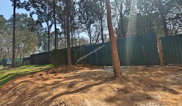 View of the green cover and secure boundary walls at the project site