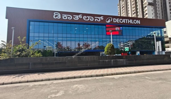 Large Decathlon sports store providing athletic gear near the project