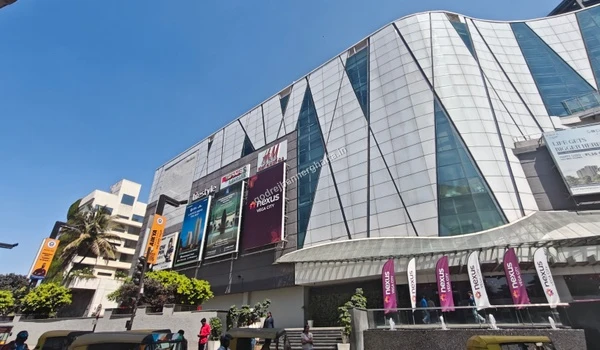 Wide angle capture of the bustling entrance to Nexus Vega City