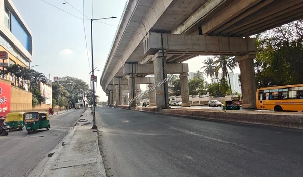 View of the metro viaduct pillars ensuring rapid transit across Bannerghatta Road