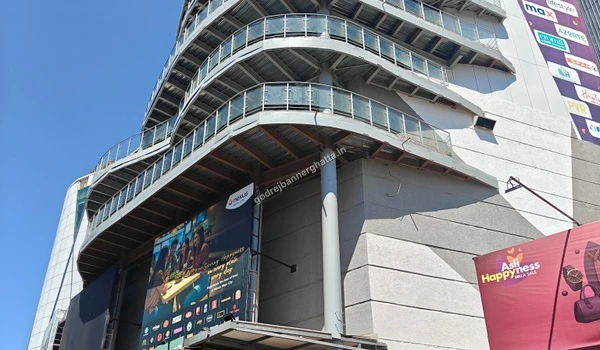 Side view of the mall highlighting the balconies and architectural details